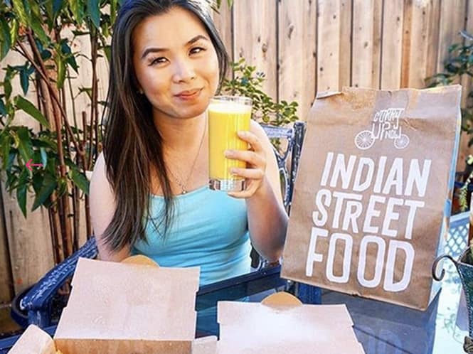 Indian Fast Casual Restaurant Girl holding drink