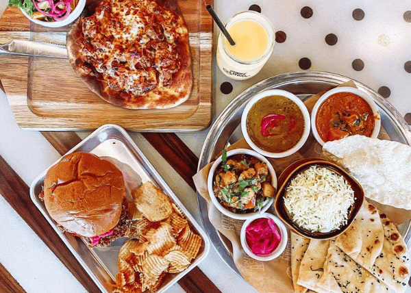 A variety of curry up now food 