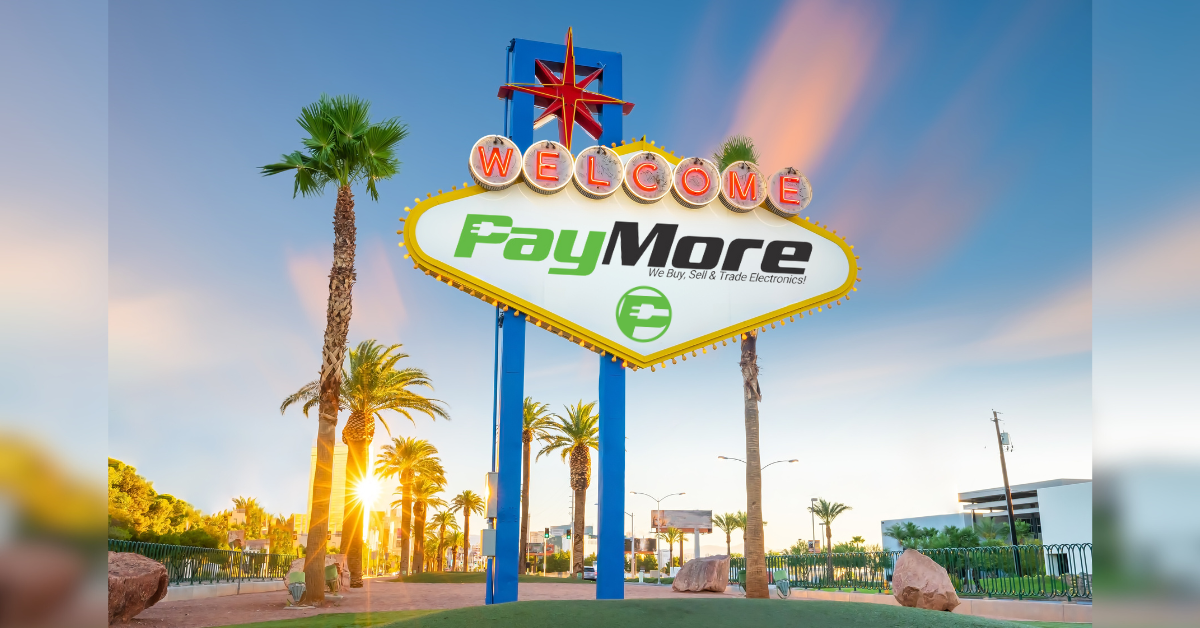 Welcome to Las Vegas sign replaces with the PayMore logo with a sunset behind the sign